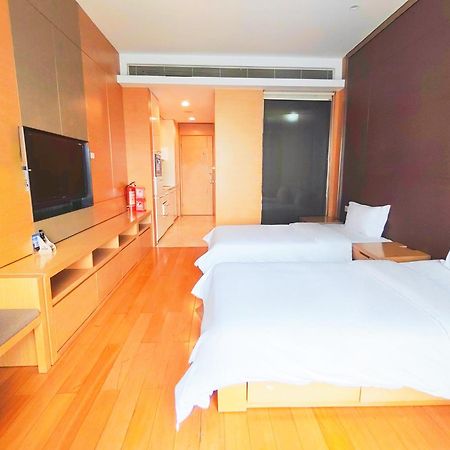 Snug Gaokong Jiangjing Hotel Kuangcsou Kültér fotó