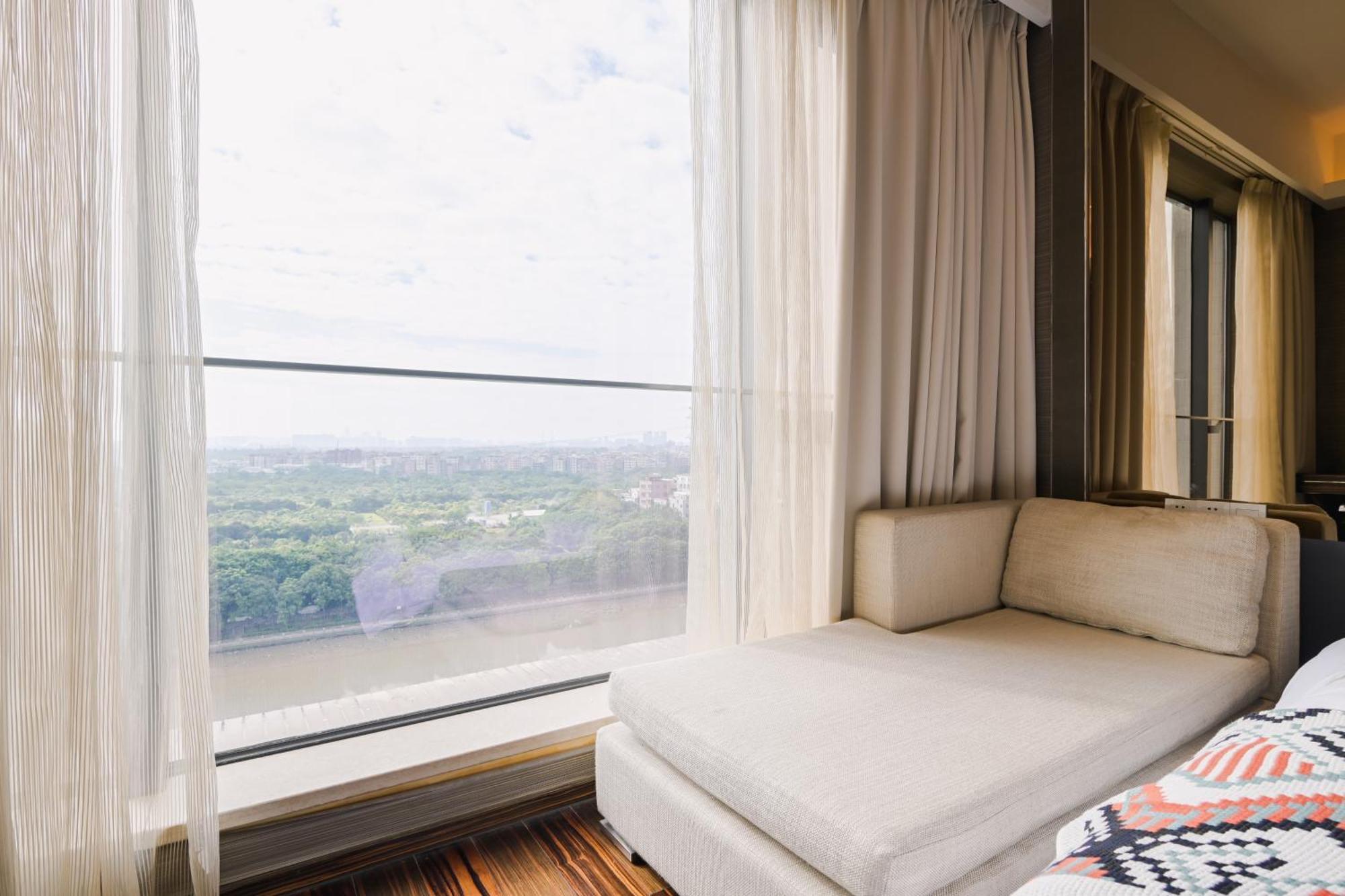 Snug Gaokong Jiangjing Hotel Kuangcsou Kültér fotó