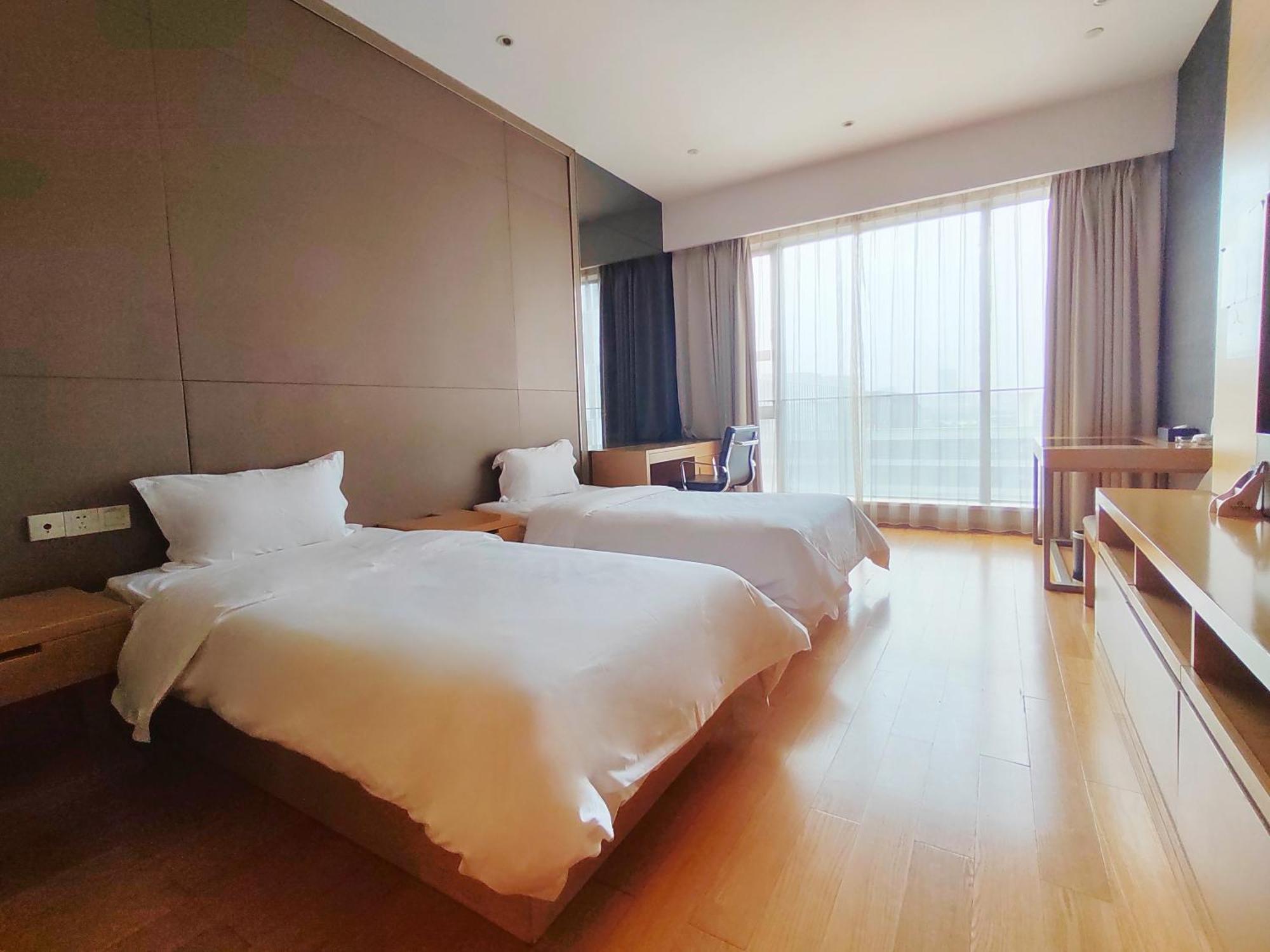 Snug Gaokong Jiangjing Hotel Kuangcsou Kültér fotó