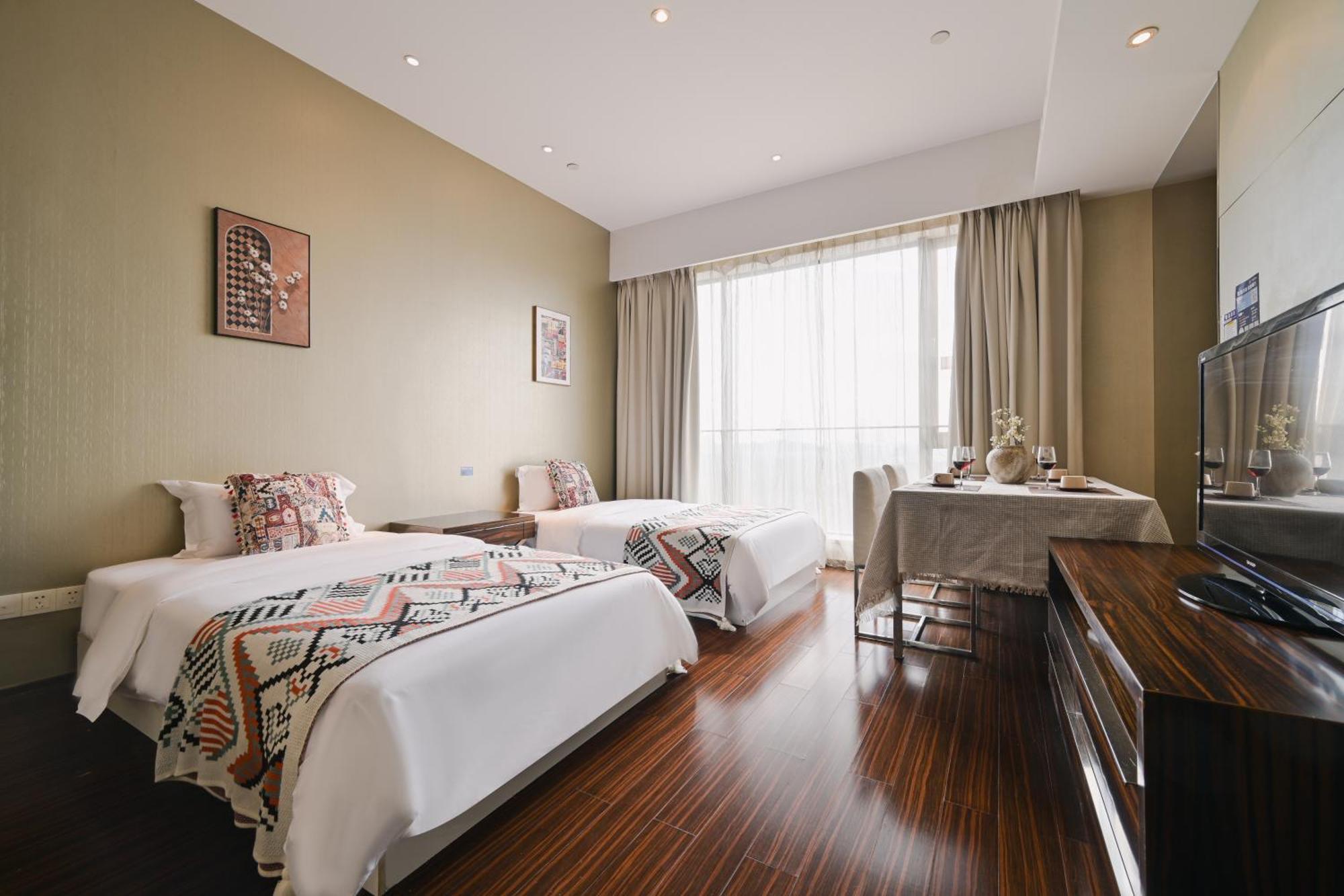Snug Gaokong Jiangjing Hotel Kuangcsou Kültér fotó