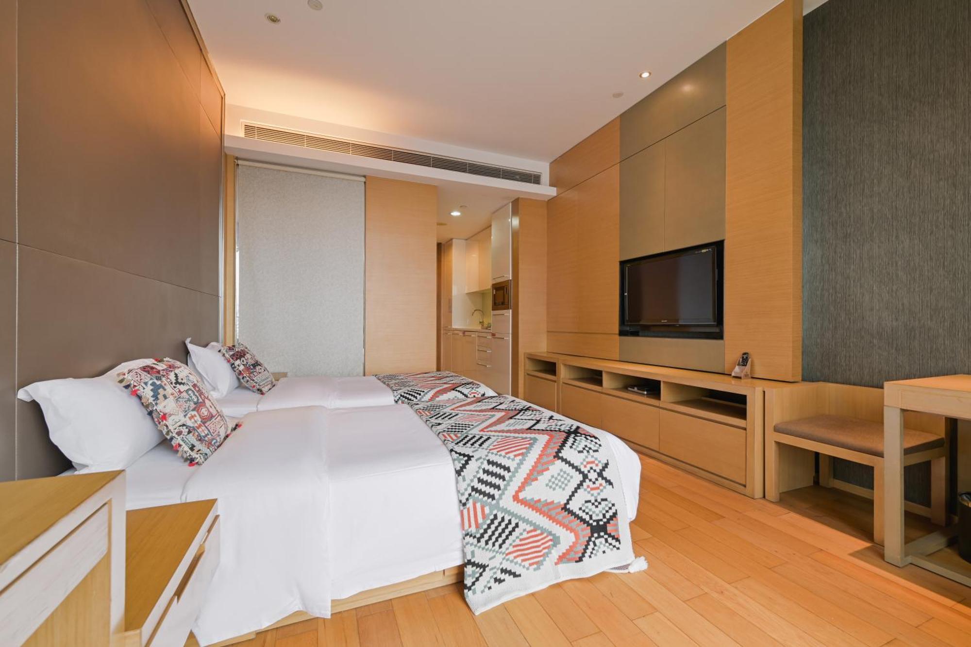 Snug Gaokong Jiangjing Hotel Kuangcsou Kültér fotó