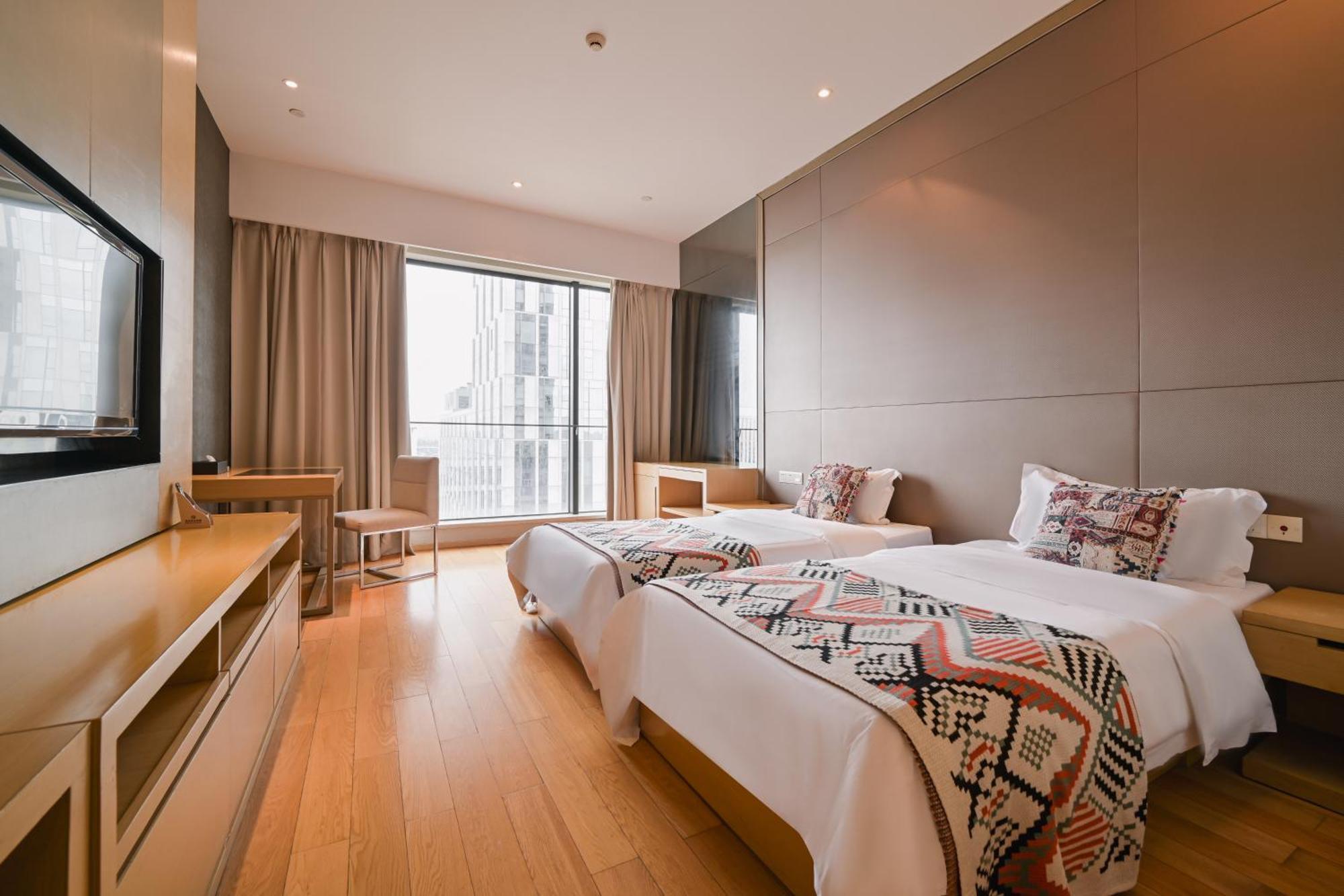 Snug Gaokong Jiangjing Hotel Kuangcsou Kültér fotó
