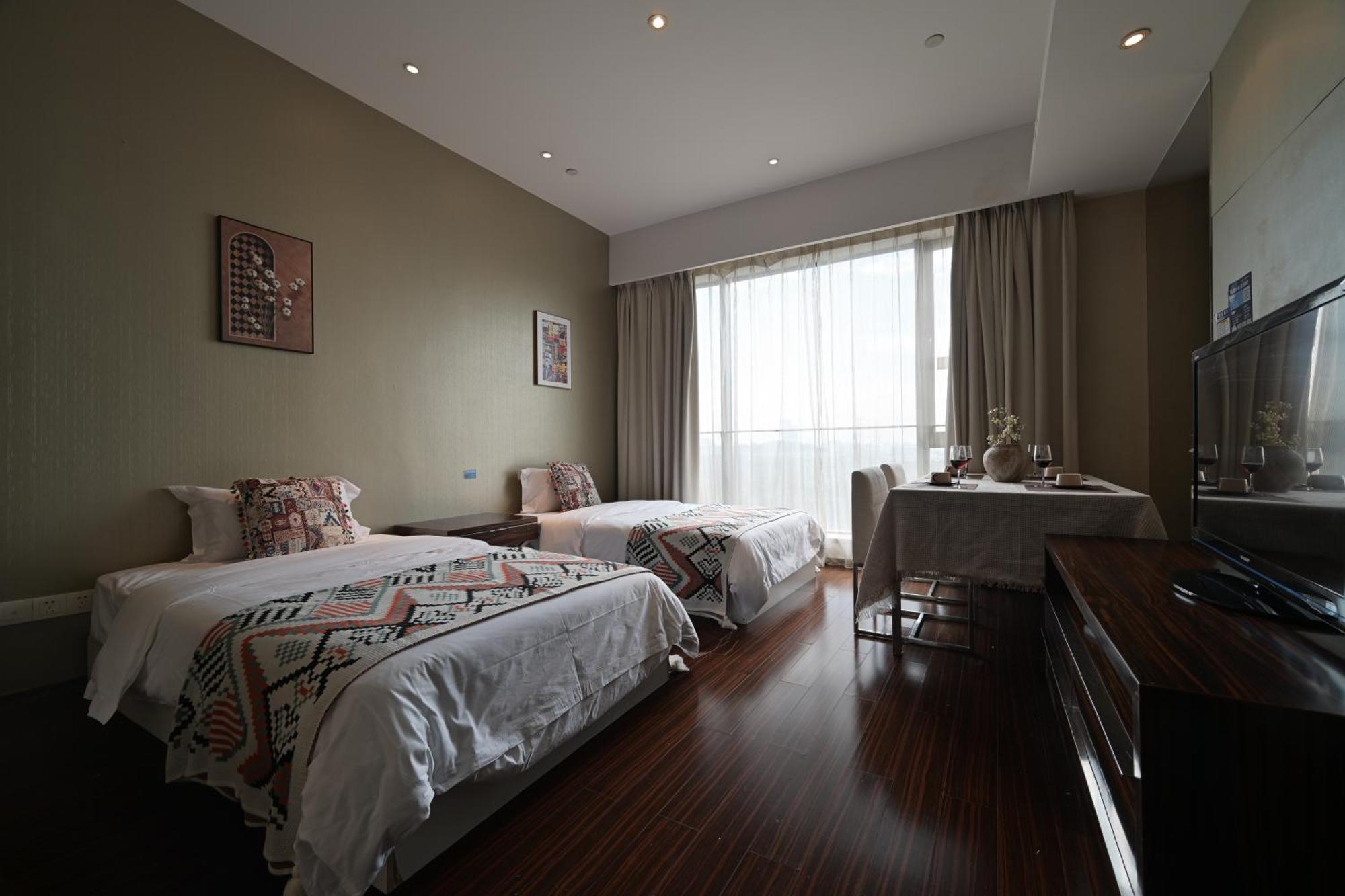 Snug Gaokong Jiangjing Hotel Kuangcsou Kültér fotó